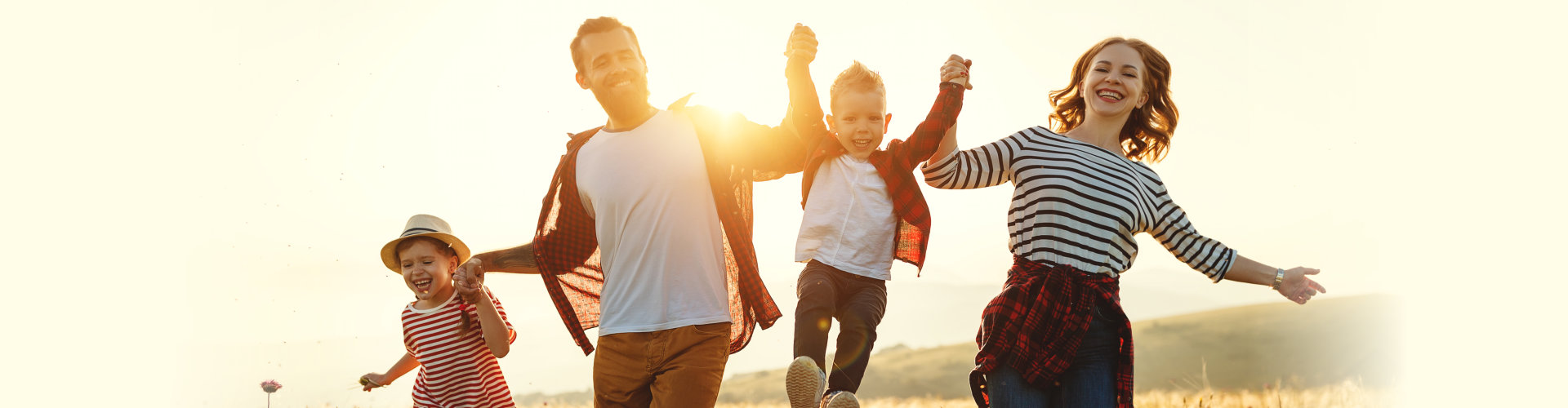 happy family nature at sunset